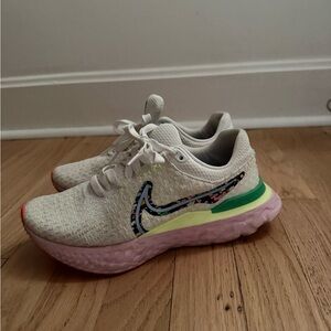 Nike White Sneakers with Pink Sole and Multi-Color Swoosh